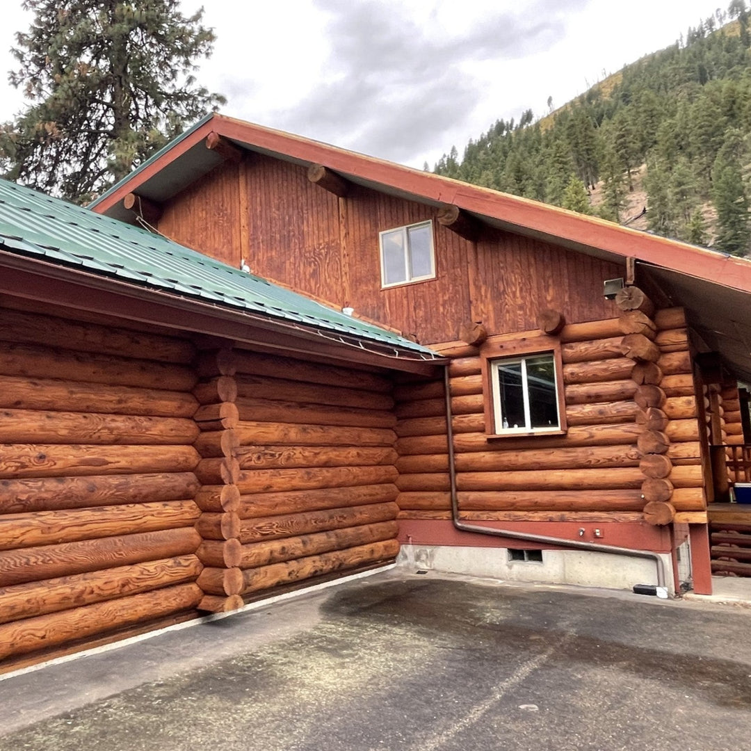 Log Home Restored and finished with Lovitt's Emerald Gold wood stain